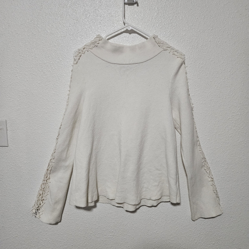 Anthropologie knitted and knotted sweater with cut out details on sleeves m boho